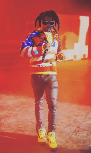 Yak Gotti wearing Supreme sweater