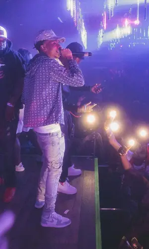 Lil Poppa wearing MCM cap