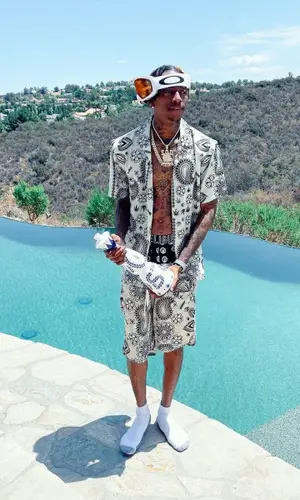 Soulja Boy wearing FashionNova shirt