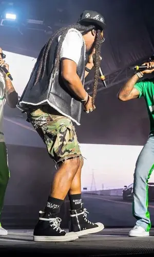 Takeoff wearing Prada eyewear