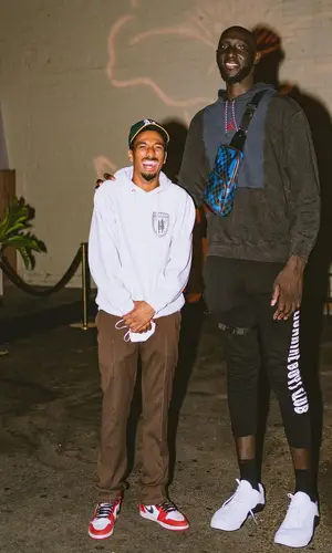 Tacko Fall wearing Billionaire Boys Club pants