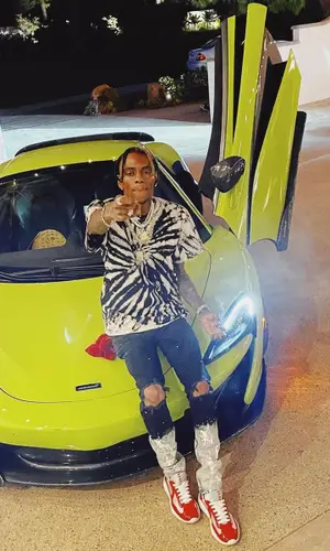 Soulja Boy wearing FashionNova t-shirt