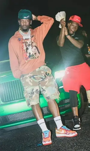 Offset wearing Balenciaga sock