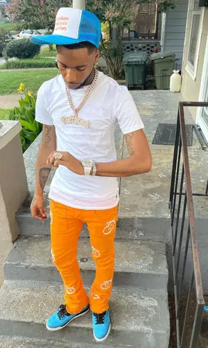 Key Glock wearing Don't Let Mom Find Out cap