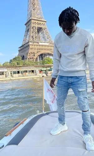 Jackboy wearing Dior backpack