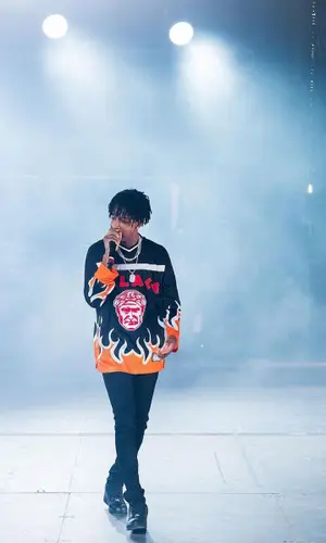 21 Savage wearing Amiri jeans