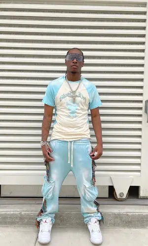 Bloody Osiris wearing Alchemist t-shirt