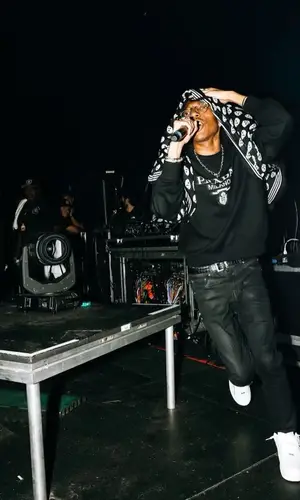 Lil Tecca wearing Alexander McQueen scarf