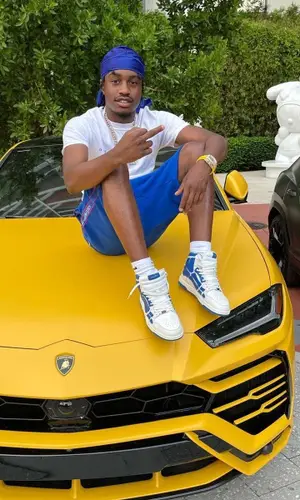 Lil Tjay wearing Nike sock