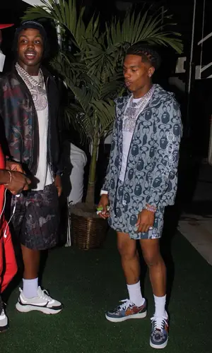 EST Gee wearing Dior shorts
