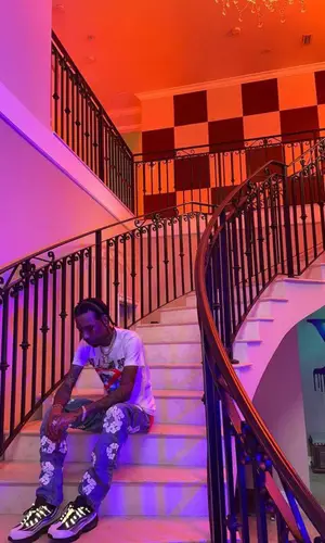 KSupreme wearing Levi’s jeans