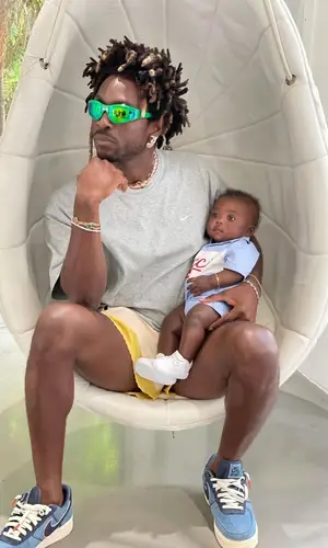 Saint JHN wearing Bottega Veneta eyewear