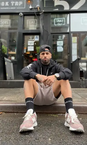 Nicky Jam wearing Nike hoody
