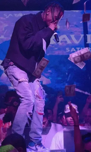 Travis Scott wearing Undercover jeans