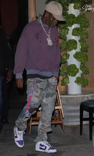 Travis Scott wearing Nike sneakers