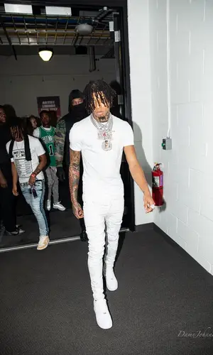NLE Choppa wearing Hanes t-shirt