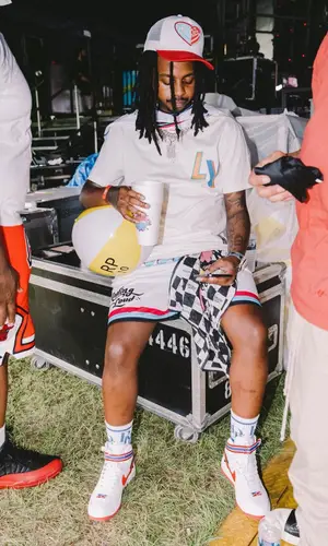 Babyface Ray wearing Rhude sock