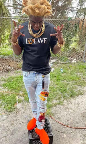 Kodak Black wearing Loewe t-shirt