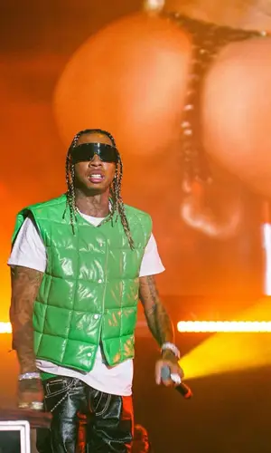 Tyga wearing Bottega Veneta belt
