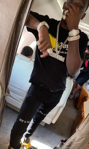 Bobby Shmurda wearing Dior belt