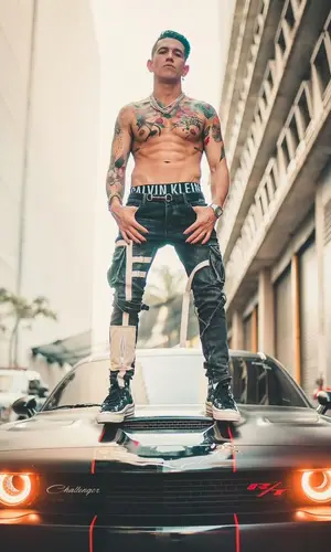 Lenny Tavarez wearing Gucci belt