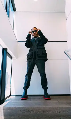 Lewis Hamilton wearing Bottega Veneta boots