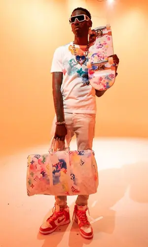 Young Dolph wearing Louis Vuitton t-shirt