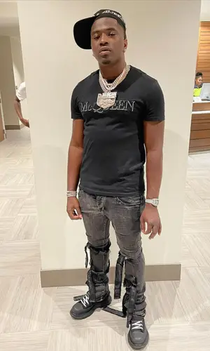 Bankroll Freddie wearing Louis Vuitton belt