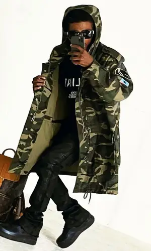 Lil HBK wearing Louis Vuitton backpack