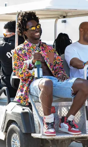 Saint JHN wearing Loewe shirt