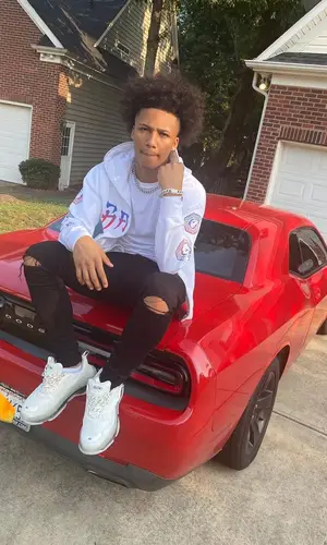 Mikey wearing Bape hoody