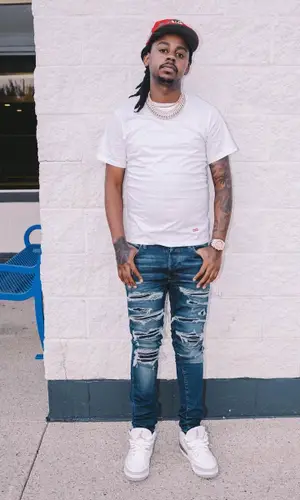 Babyface Ray wearing Supreme t-shirt