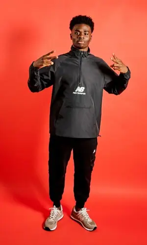 Bukayo Saka wearing New Balance jacket