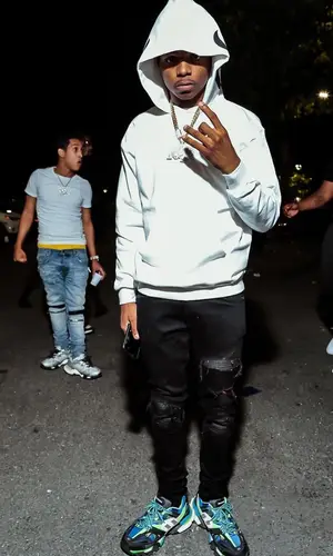 TJ Porter wearing Amiri jeans