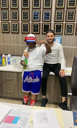 42 Dugg wearing Chrome Hearts cap