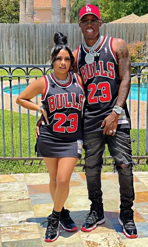 Cj So Smooth wearing Mitchell & Ness jersey
