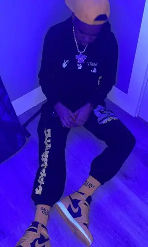 Lil Poppa wearing Gallery Dept. sock