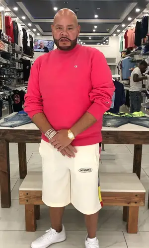 Fat Joe wearing Champion sweatshirt