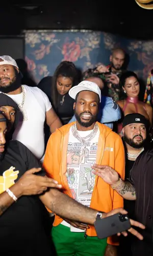 Meek Mill wearing Soho Youth Club hoody