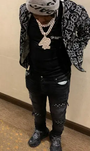 42 Dugg wearing Louis Vuitton hoody
