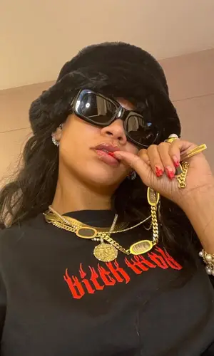 Rihanna wearing Married To The Mob t-shirt