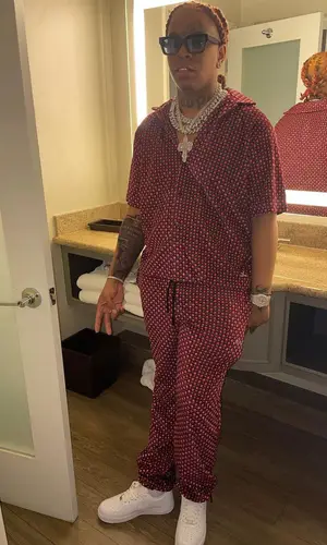 Lil Gotit wearing Amiri shirt