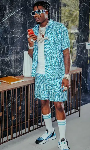 CJ So Cool wearing Amiri sock