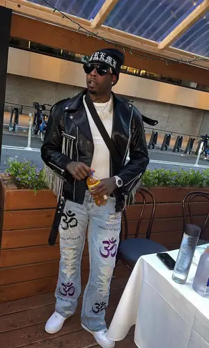 Lil Duke wearing Versace eyewear
