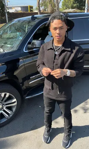 Luh Kel wearing Tier jacket
