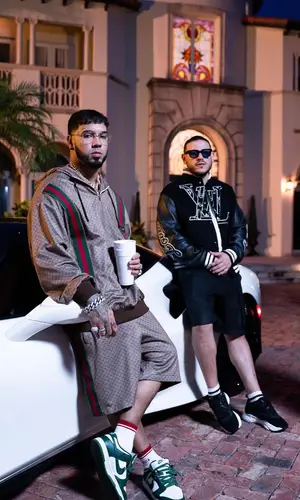 Anuel AA wearing Gucci hoody
