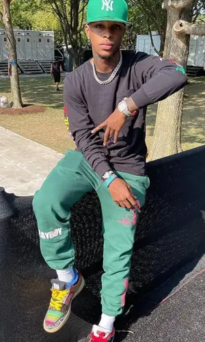 Toosii wearing Chrome Hearts sweatshirt