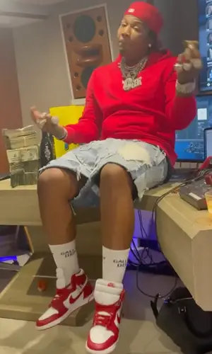Moneybagg Yo wearing Gallery Dept. sock