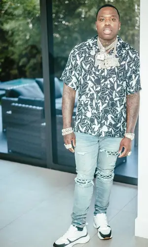 BandMan Kevo wearing Amiri shirt