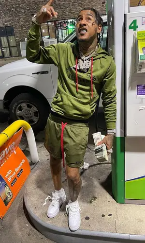 IME Casino wearing Nike sneakers
